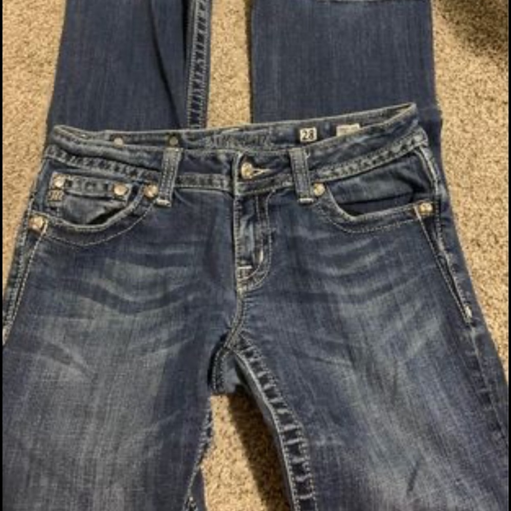 Miss Me Jeans, they are boot cut, size 28 in womens, paid over $200 for them.
